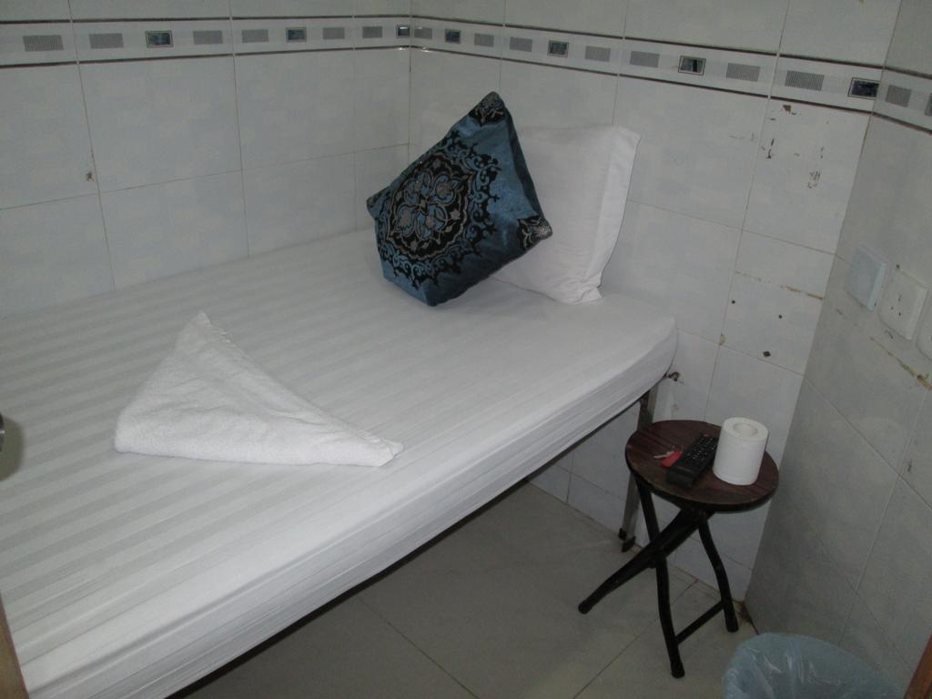 Global Inn Цзюлун Экстерьер фото