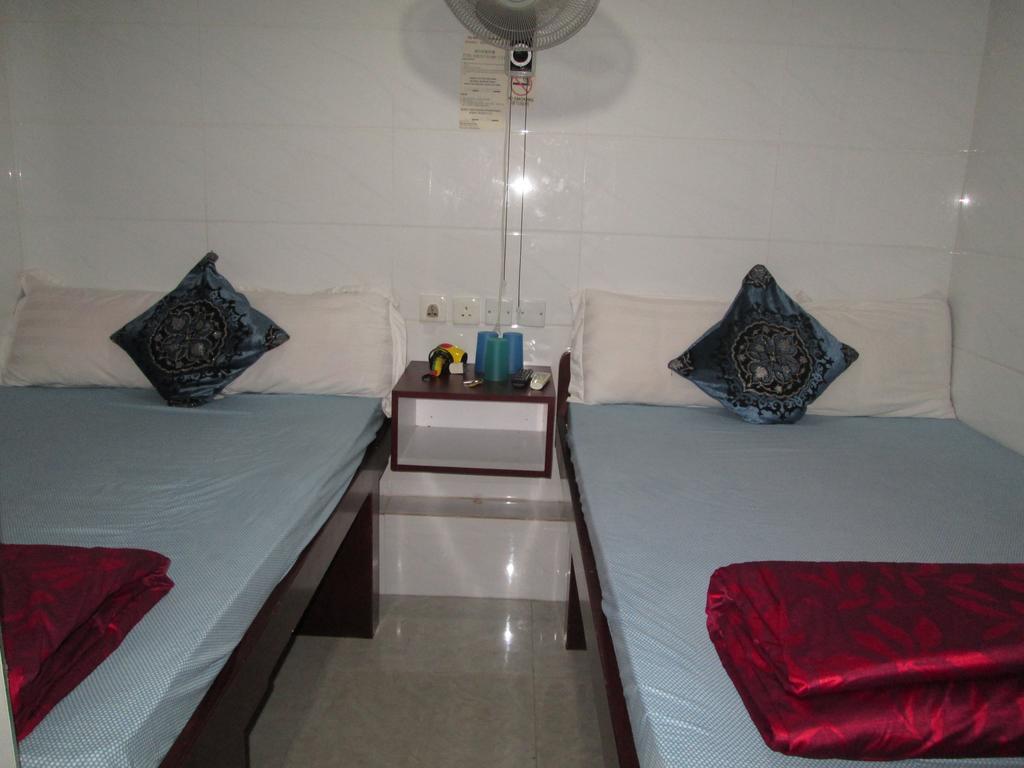 Global Inn Цзюлун Экстерьер фото