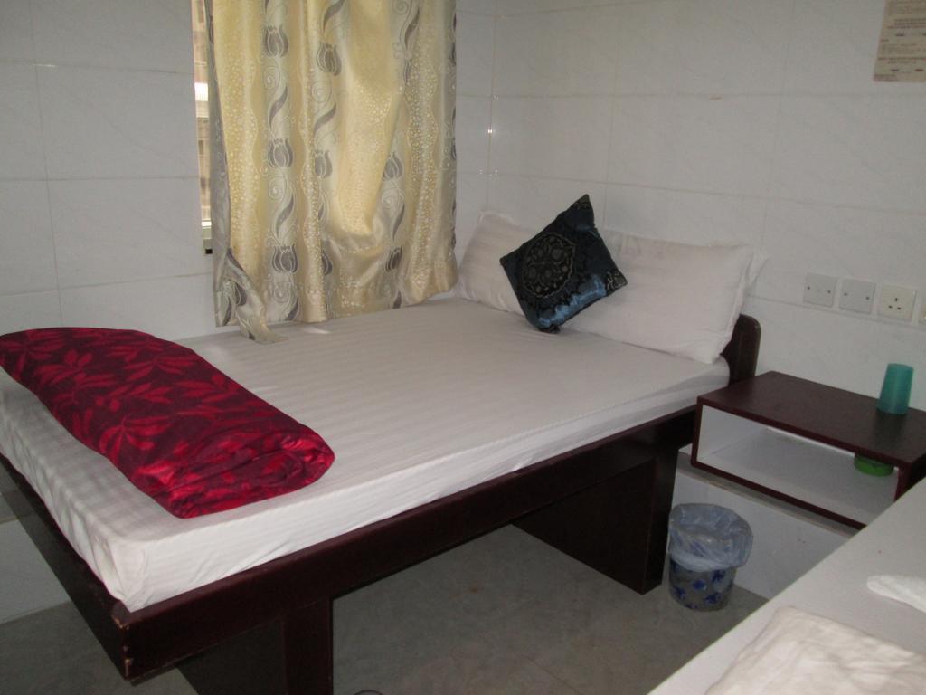 Global Inn Цзюлун Экстерьер фото
